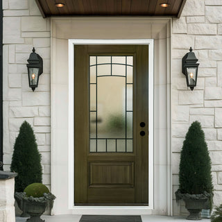Olive-green FRAMEWELL fiberglass entry door (36x80) featuring a black wrought iron grille over frosted glass with lockset pre-bored, installed in a modern stone-clad home.