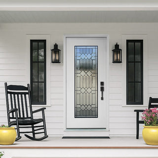 A FRAMEWELL white fiberglass entry door (36x80) with intricate geometric decorative glass and black caming, installed on a modern farmhouse porch.